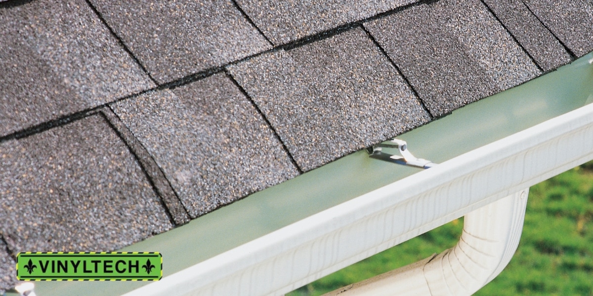 Close-up view of a professionally installed seamless gutter system by Vinyltech, showcasing sleek design, durability, and superior craftsmanship.