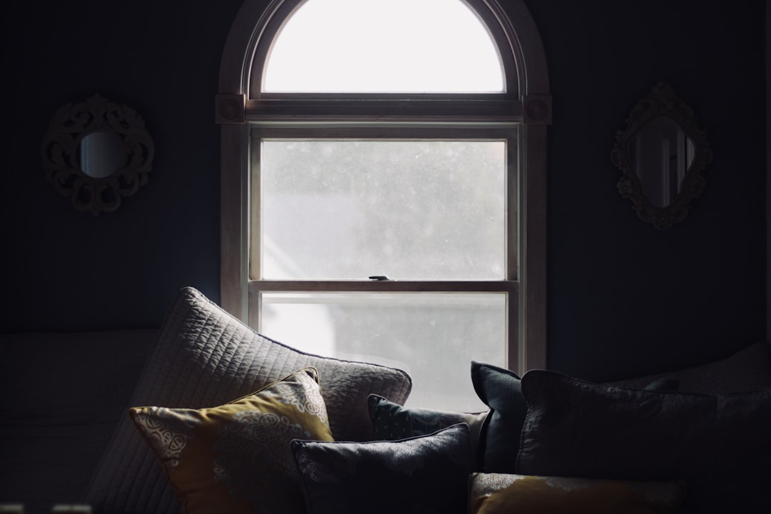A peaceful and bright hurricane-resistant home, conveying security and peace of mind for homeowners.. Photo by Jake Lorefice on Unsplash. A peaceful and bright hurricane-resistant home, conveying security and peace of mind for homeowners.